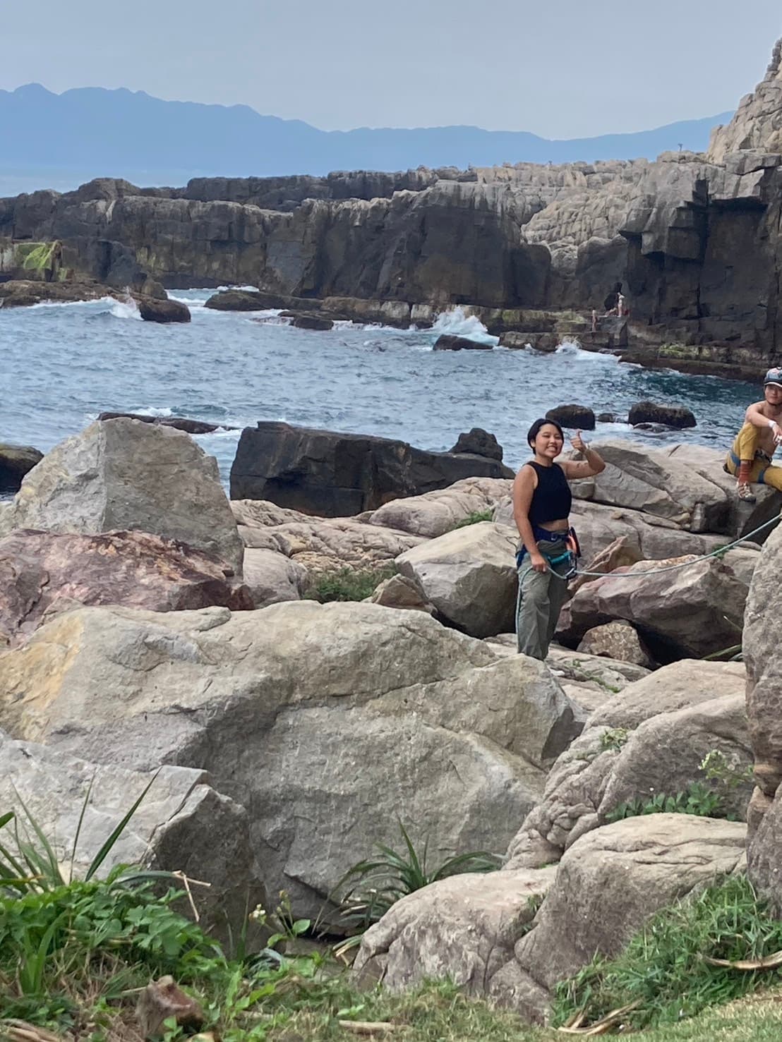 Yiting rock climbing on the coast