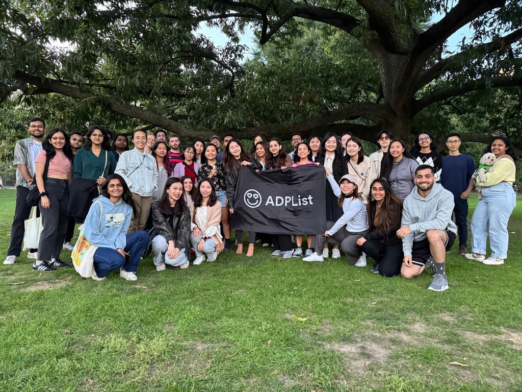 Group photo with the ADPList community on the grass