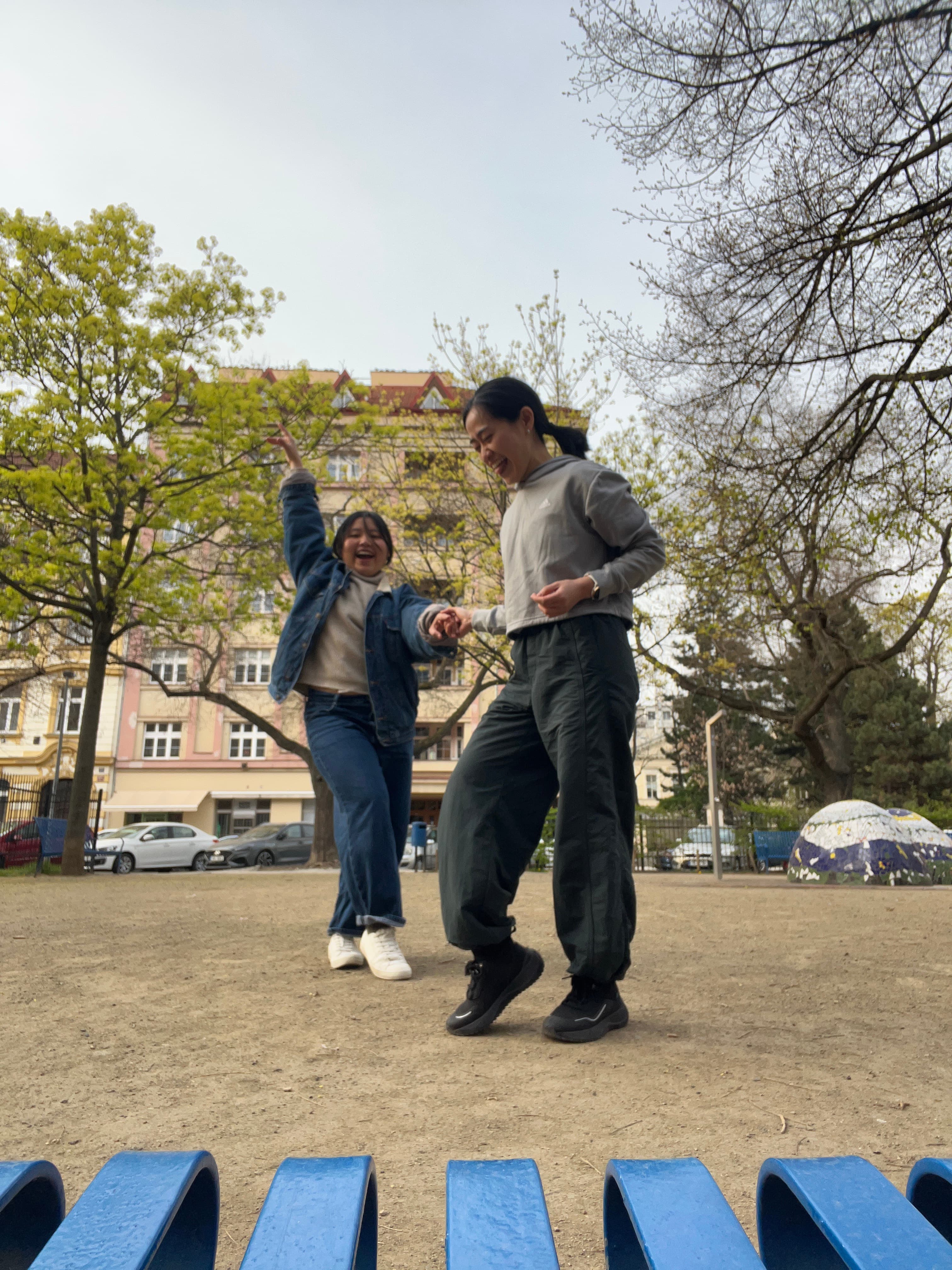 Dancing with a partner in a park in Prague